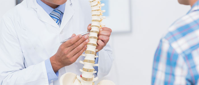 chiropractor explaining disc pain